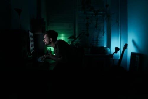 slouching-and-poor-posture-guy-hunching-forward-looking-at-computer-text-neck-tech-neck-mental-health